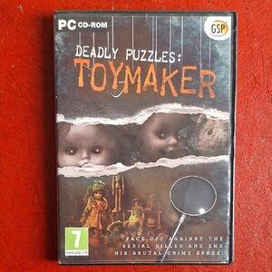 Deadly Puzzles: Toymaker PC Game — GSP — Black & Orange Cover